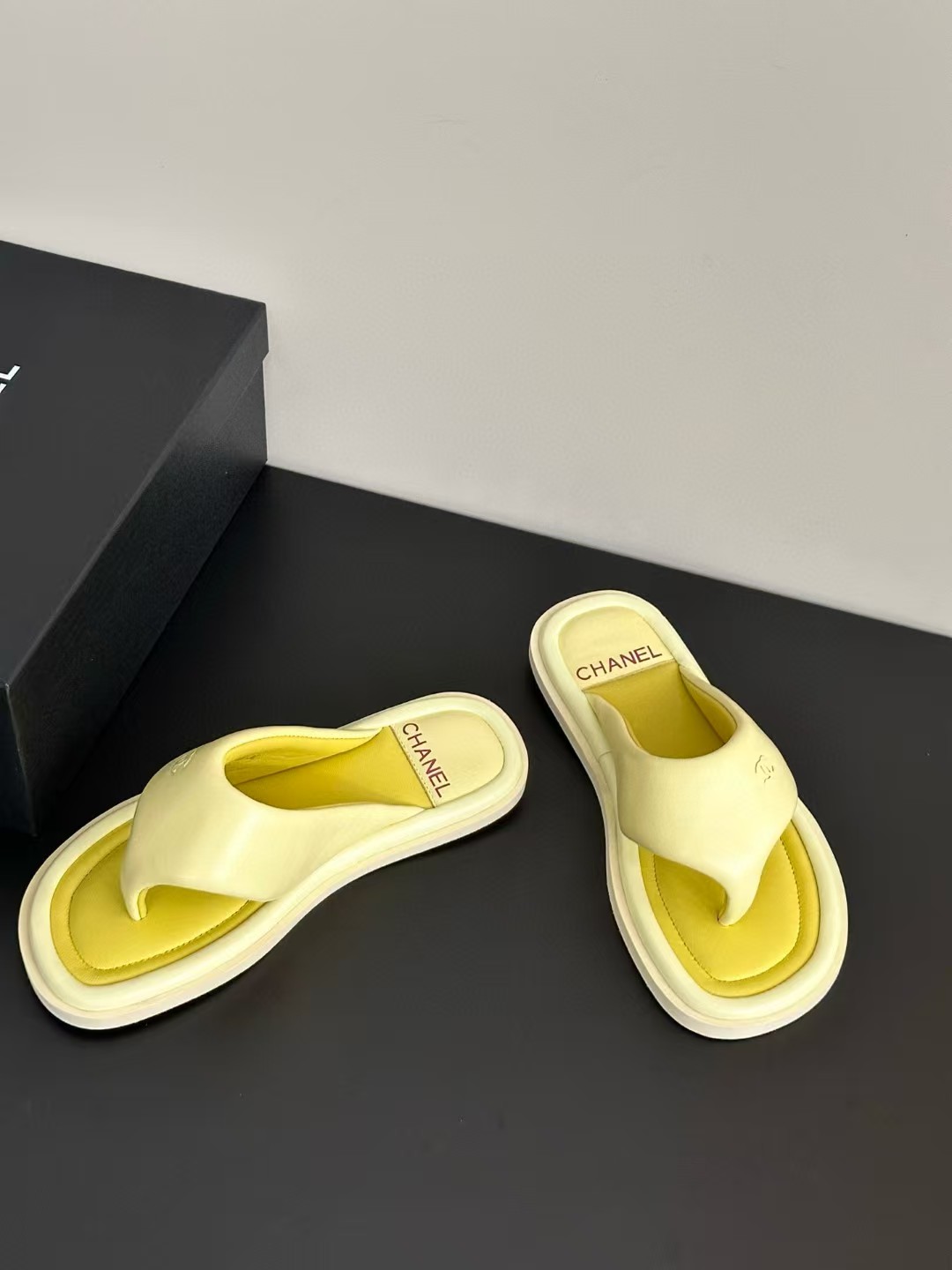 Chanel bread flip-flops