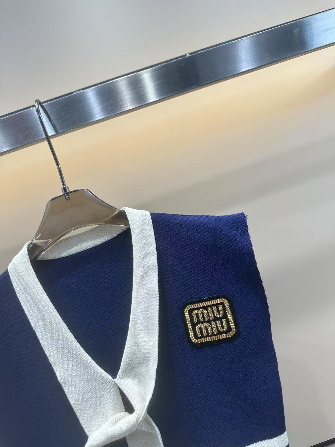 MIUMIU sleeveless T-shirt