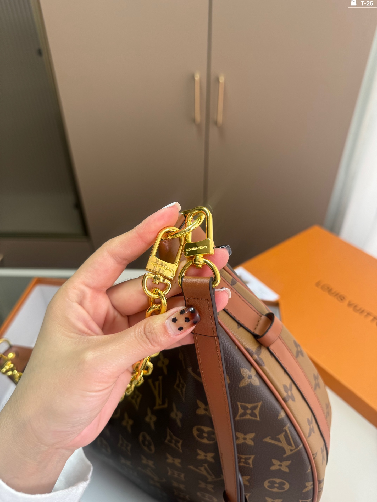 LV crescent-shaped bag chain strap shoulder bag