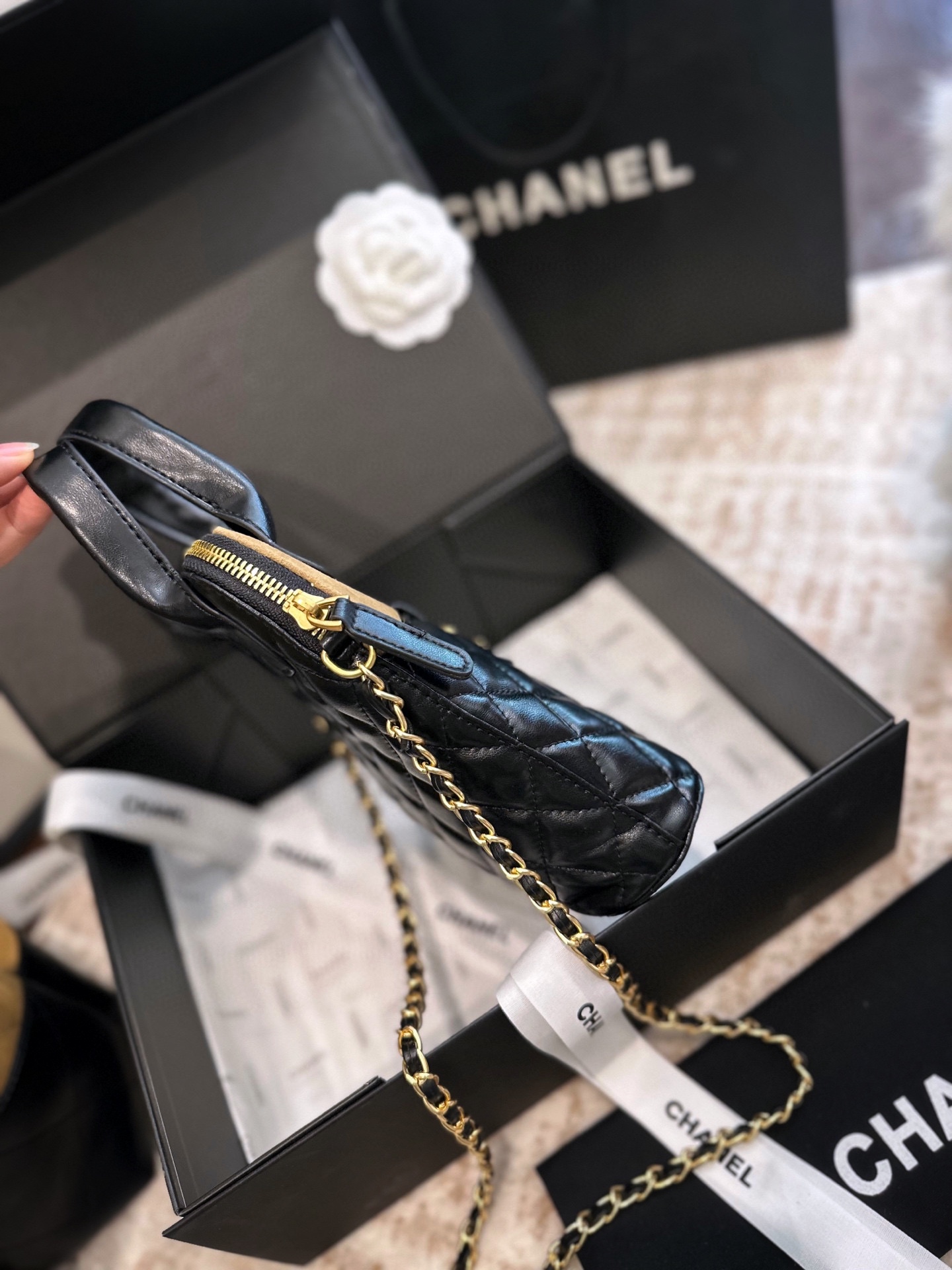 CHANEL 25a hand-held chain bag