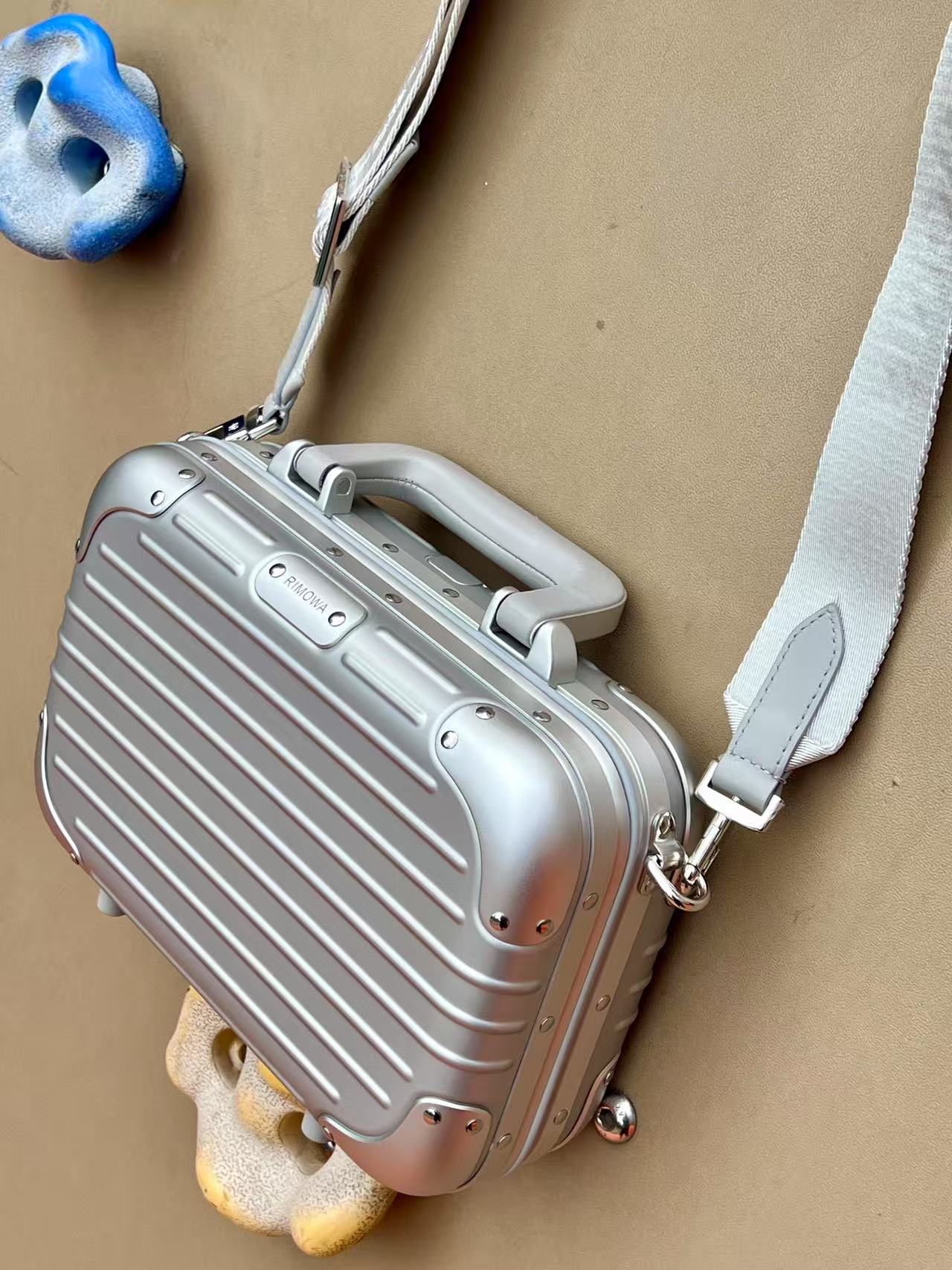RIMOWA hand-held crossbody suitcase