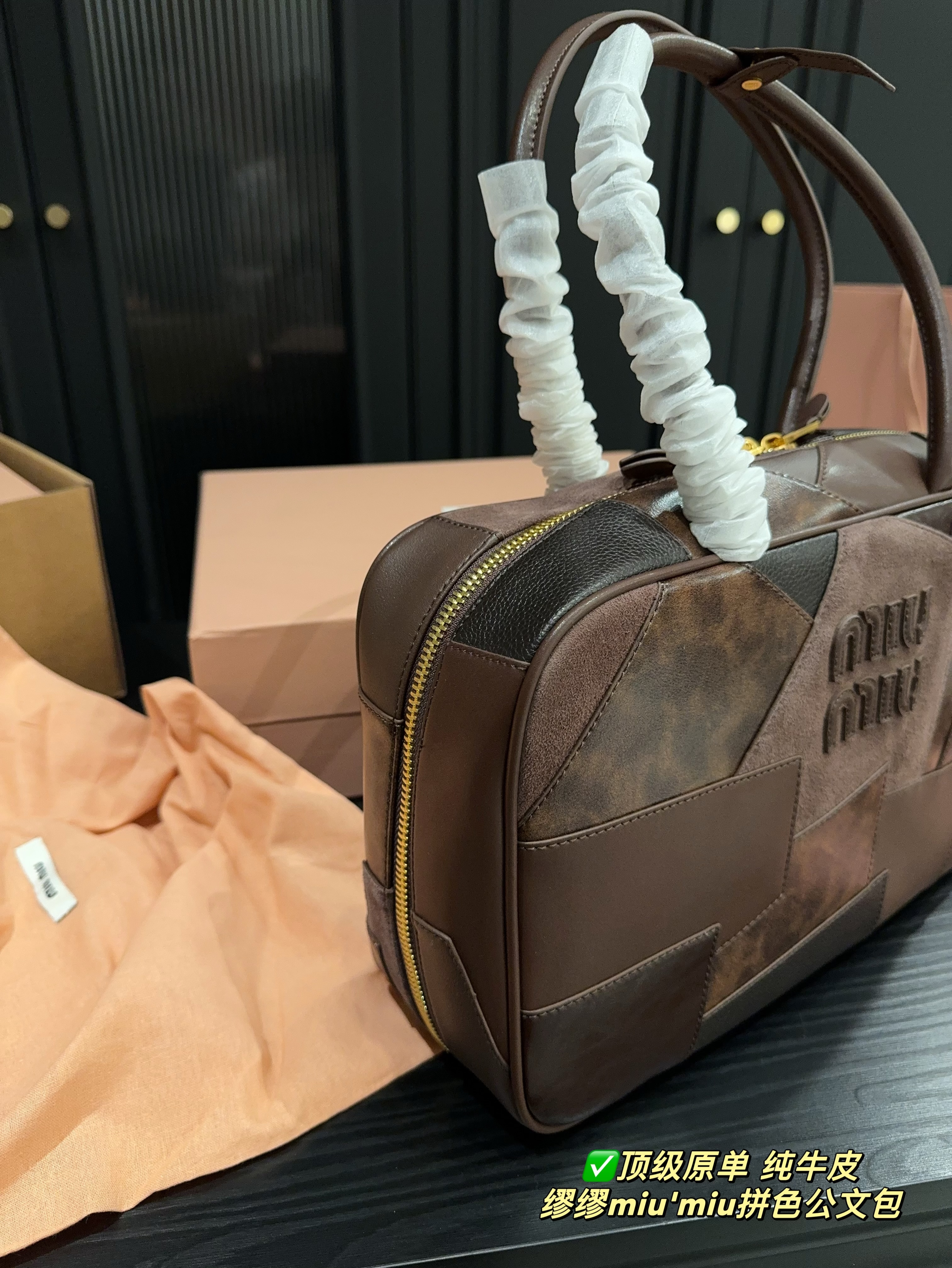 MIUMIU's two-tone briefcase
