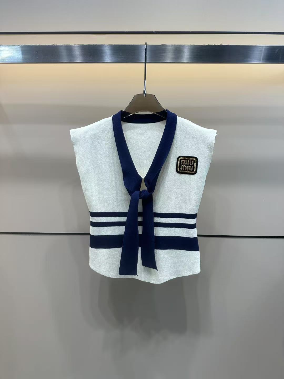 MIUMIU sleeveless T-shirt