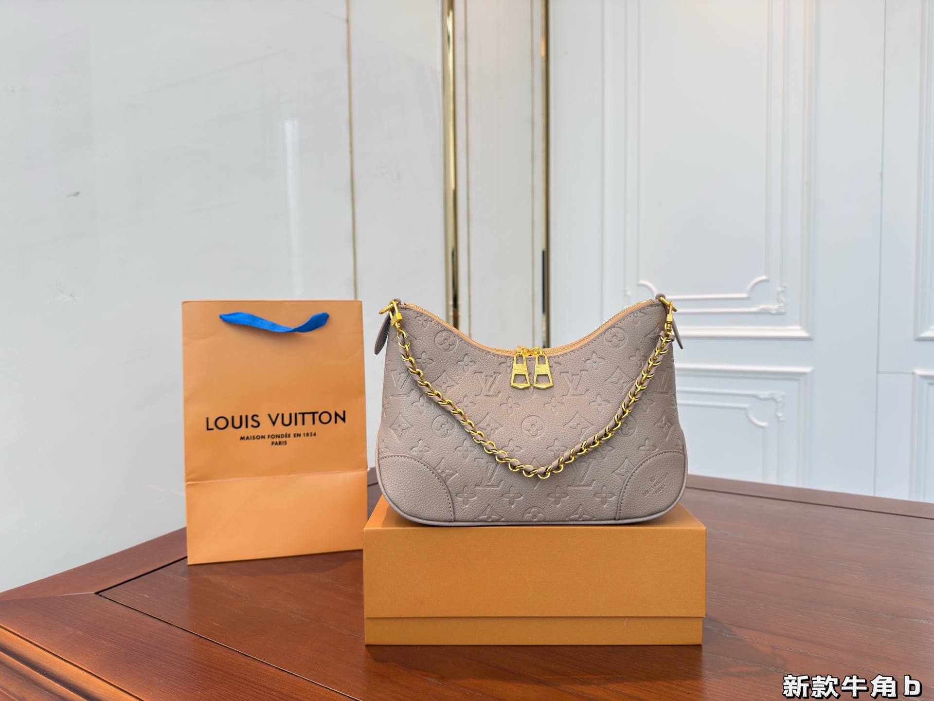 Lv embossed croissant shoulder crossbody underarm bag