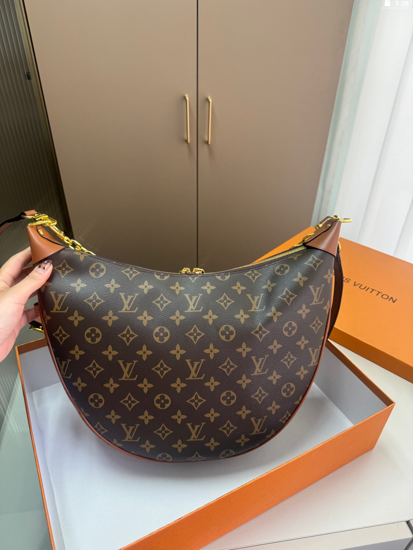 LV crescent-shaped bag chain strap shoulder bag