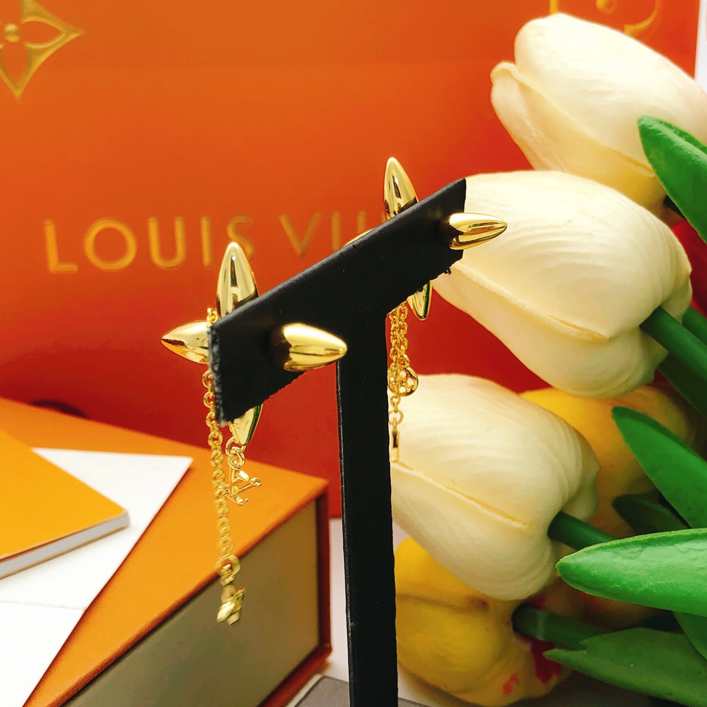 LV polished tassel earrings