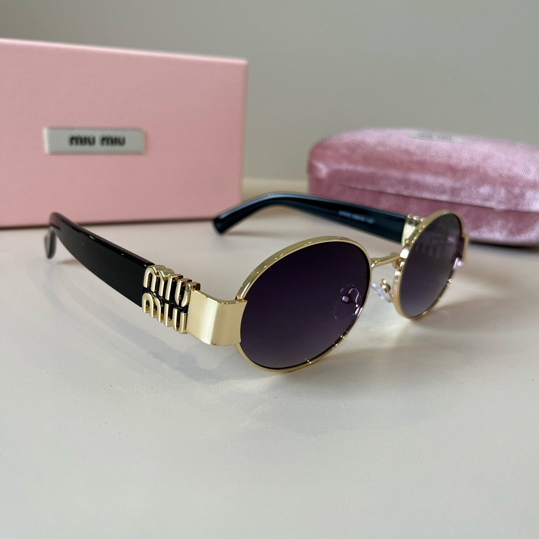 MIUMIU round sunglasses