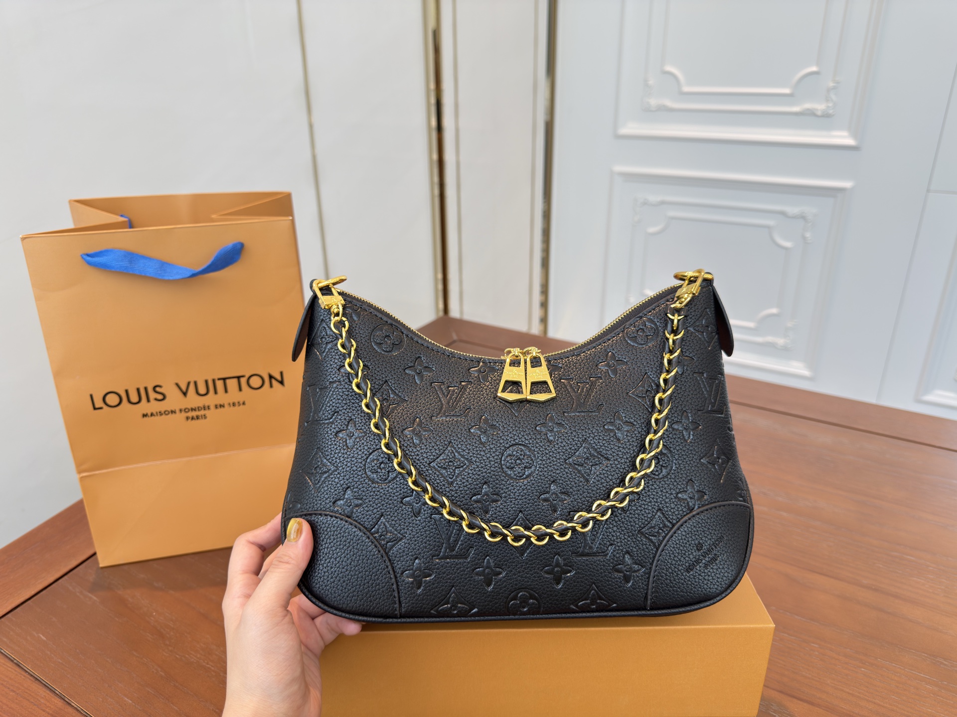 Lv embossed croissant shoulder crossbody underarm bag