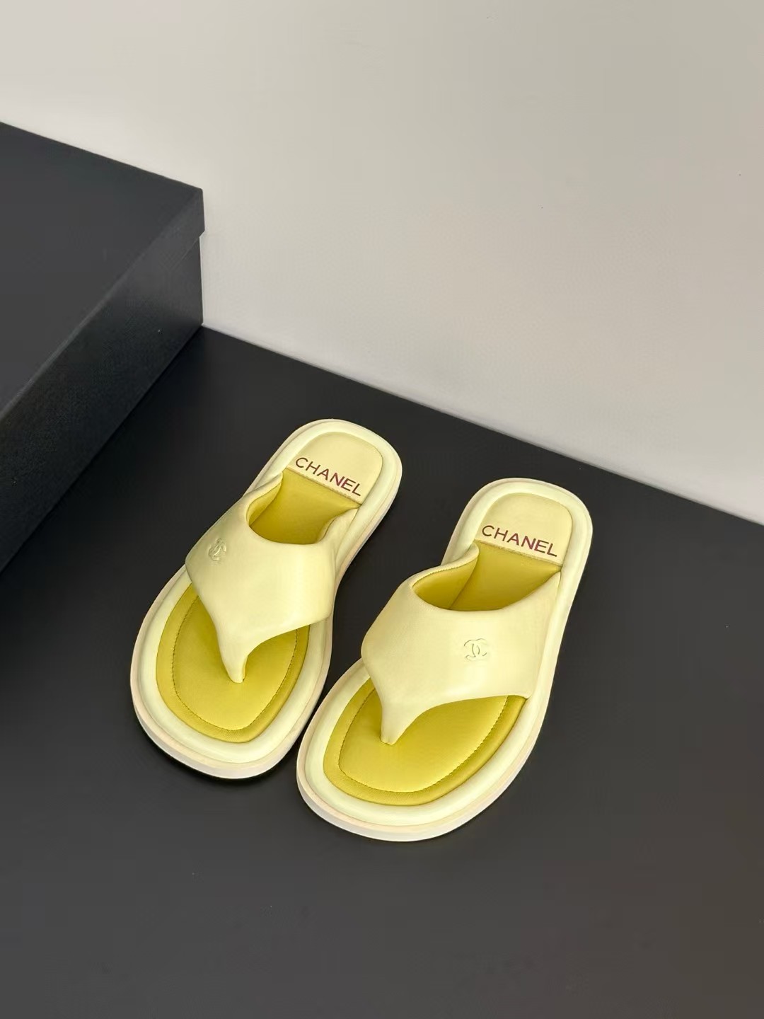 Chanel bread flip-flops