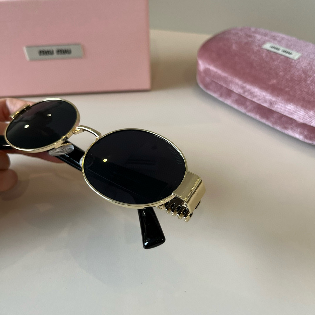 MIUMIU round sunglasses
