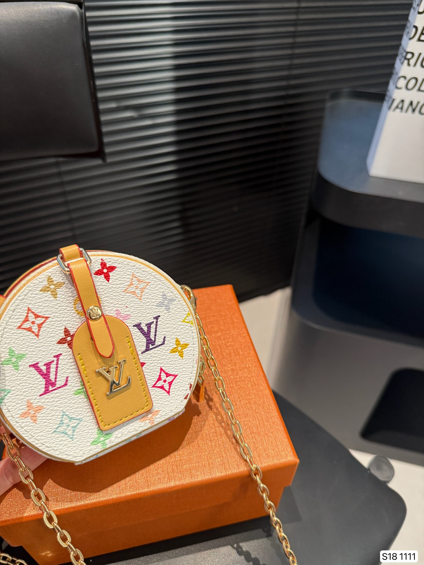 LV round pancake coin purse