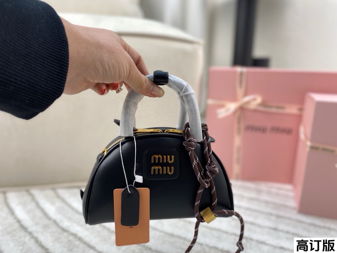 Miumiu half-moon handbag