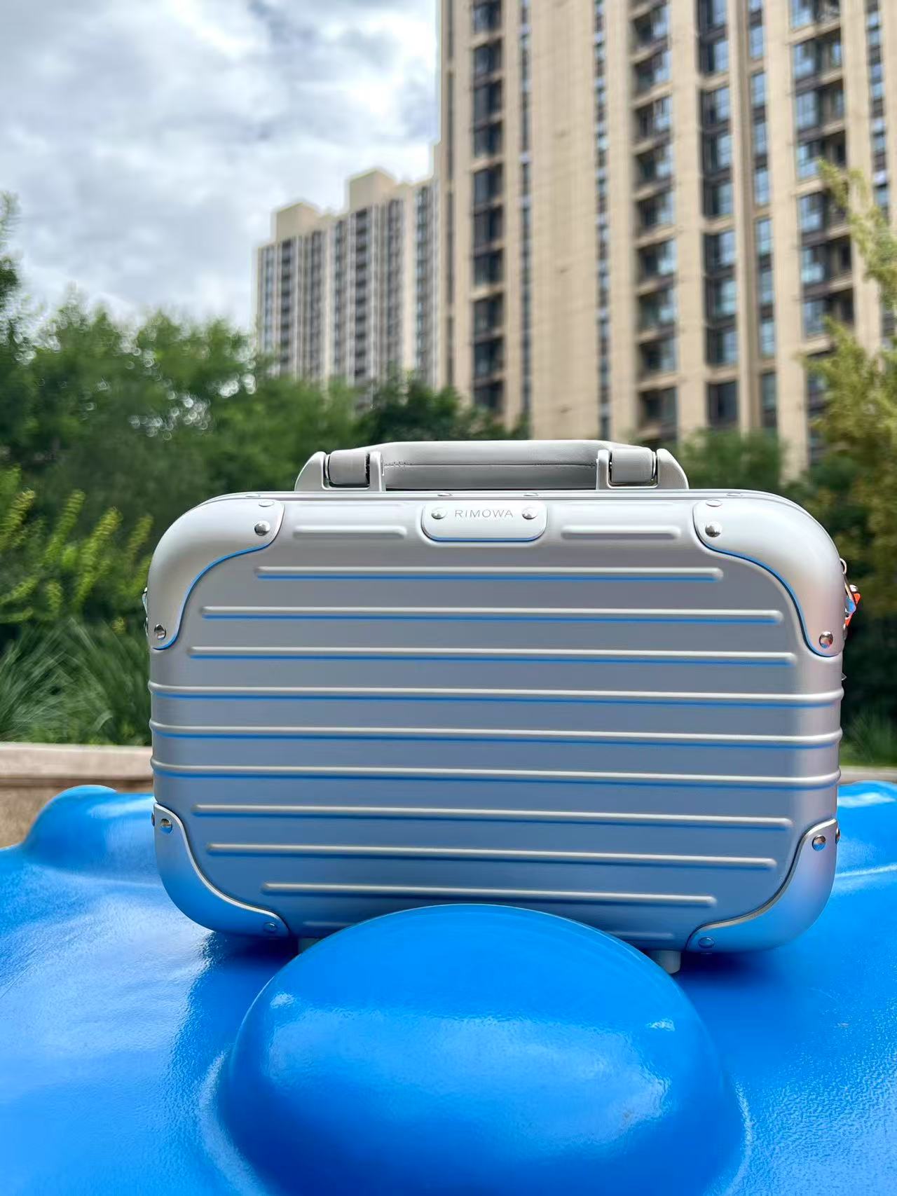 RIMOWA hand-held crossbody suitcase