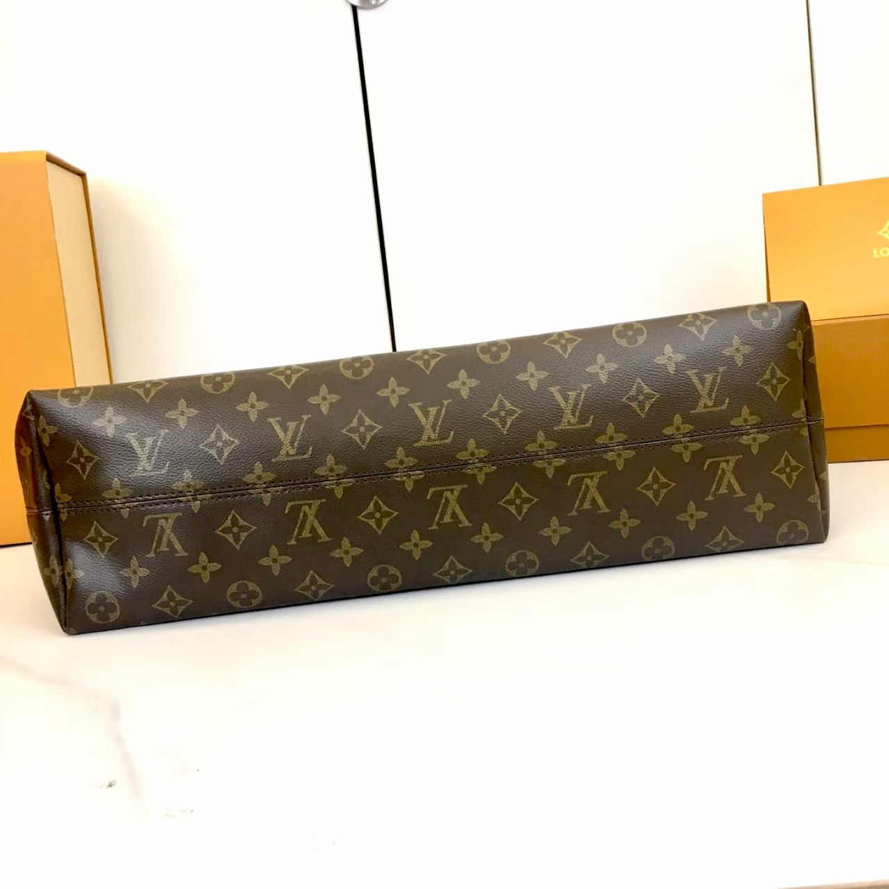LV again artsy monogram handbag