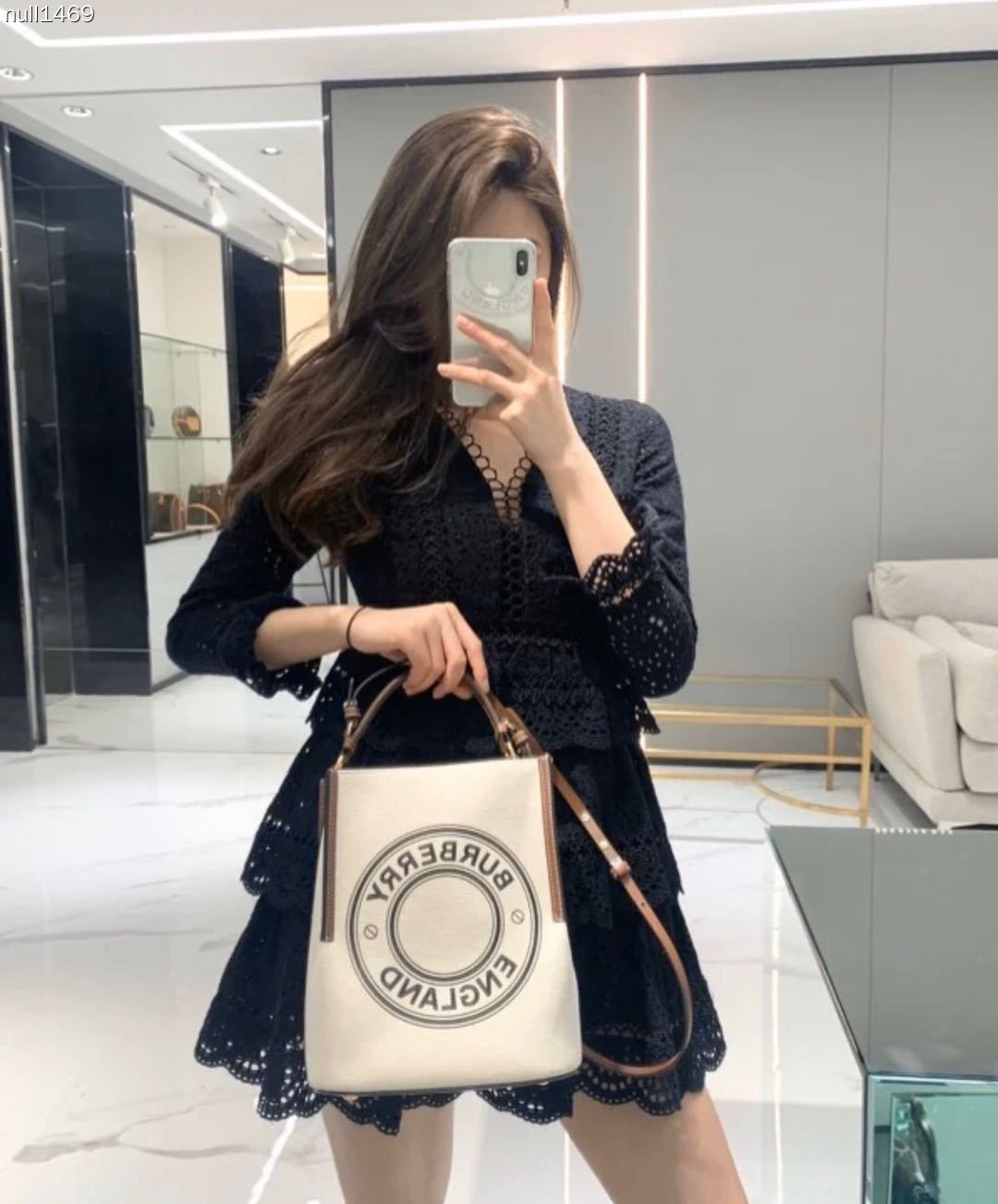 Burberry equestrian-style cotton canvas bucket bag