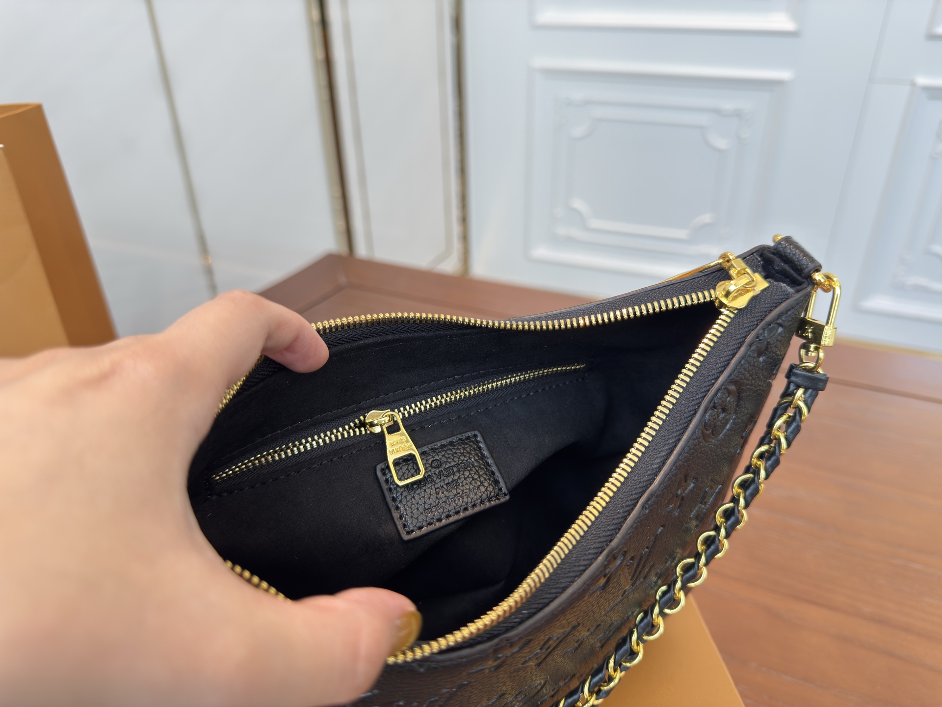 Lv embossed croissant shoulder crossbody underarm bag