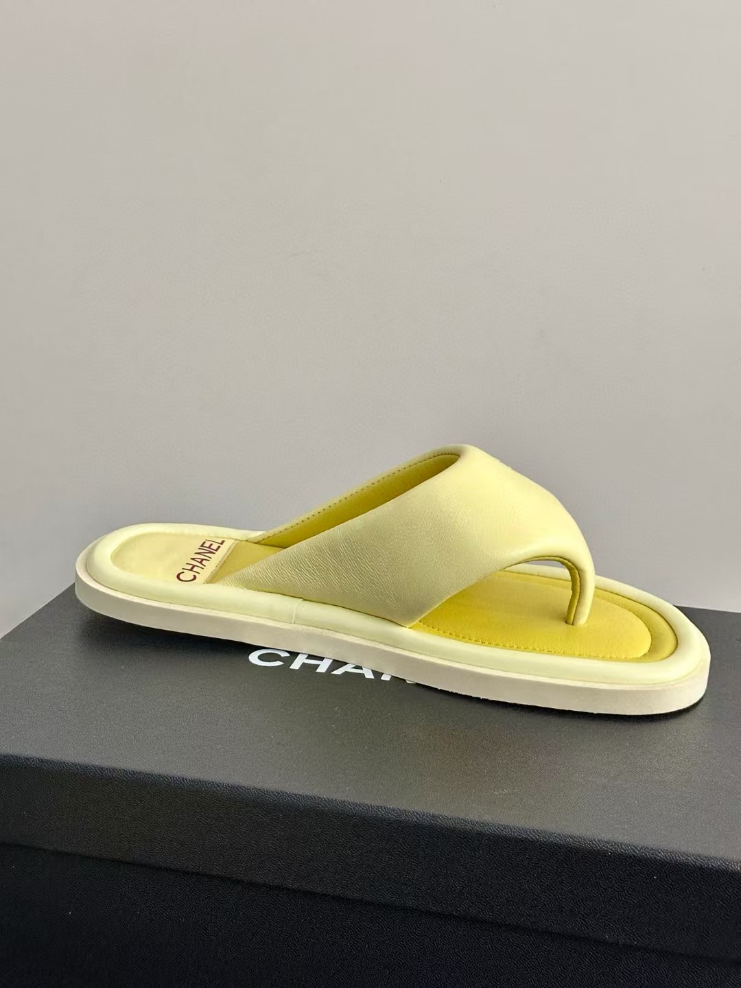 Chanel bread flip-flops