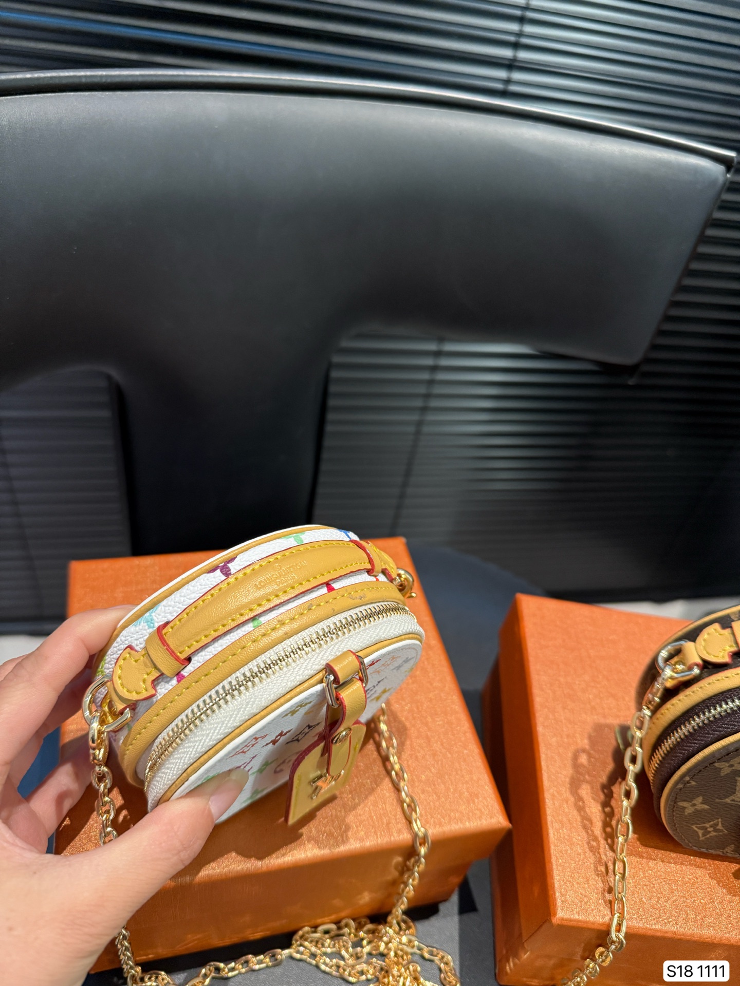 LV round pancake coin purse