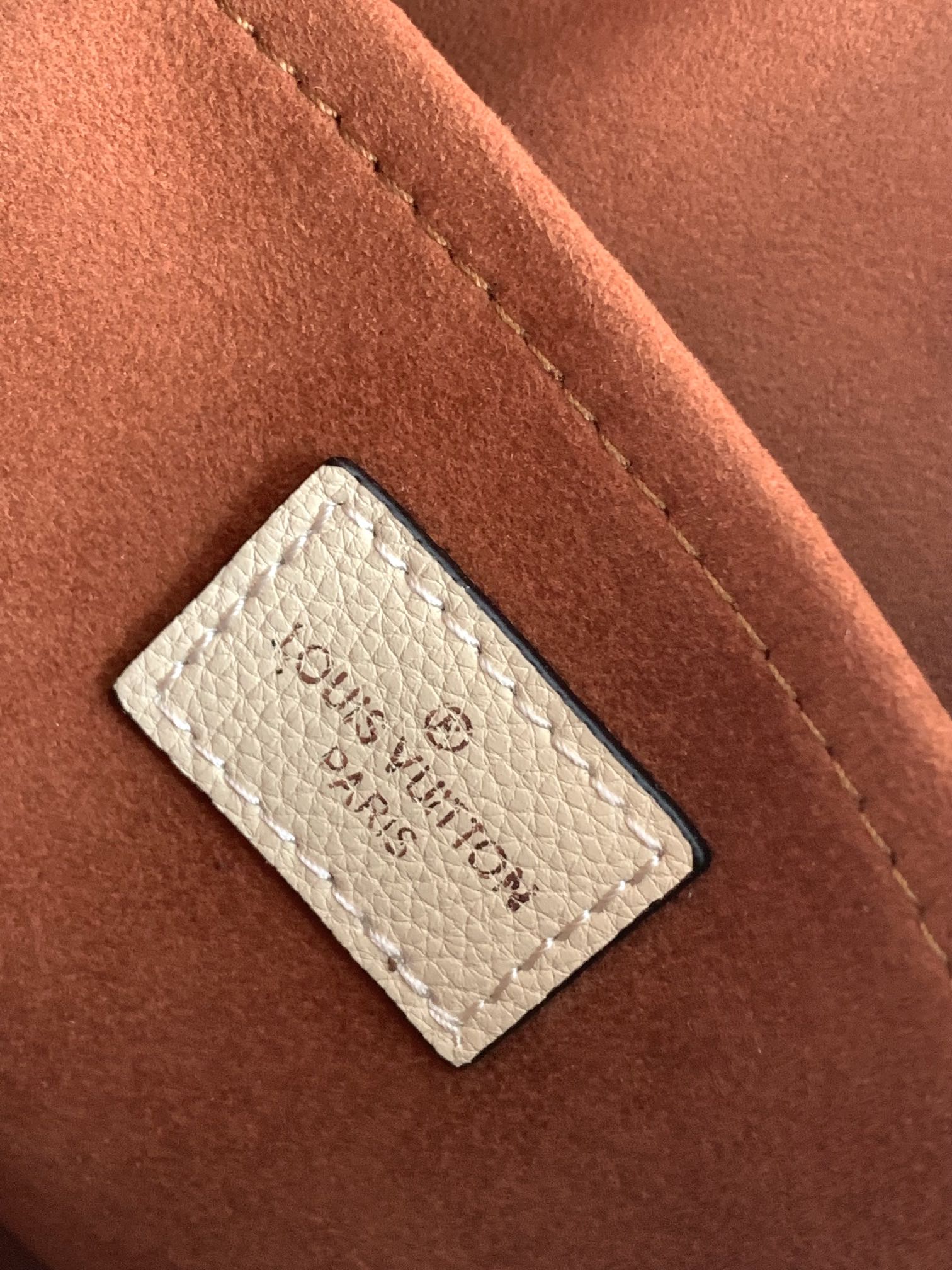 Top version LV Mahina Hand It All shoulder bag