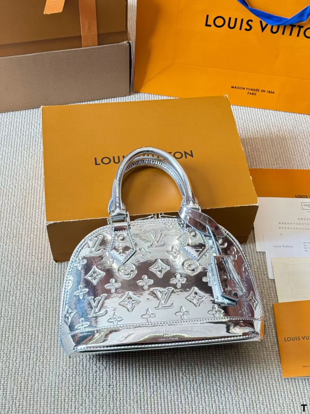 LV Alma BB silver handbag classic Monogram pattern
