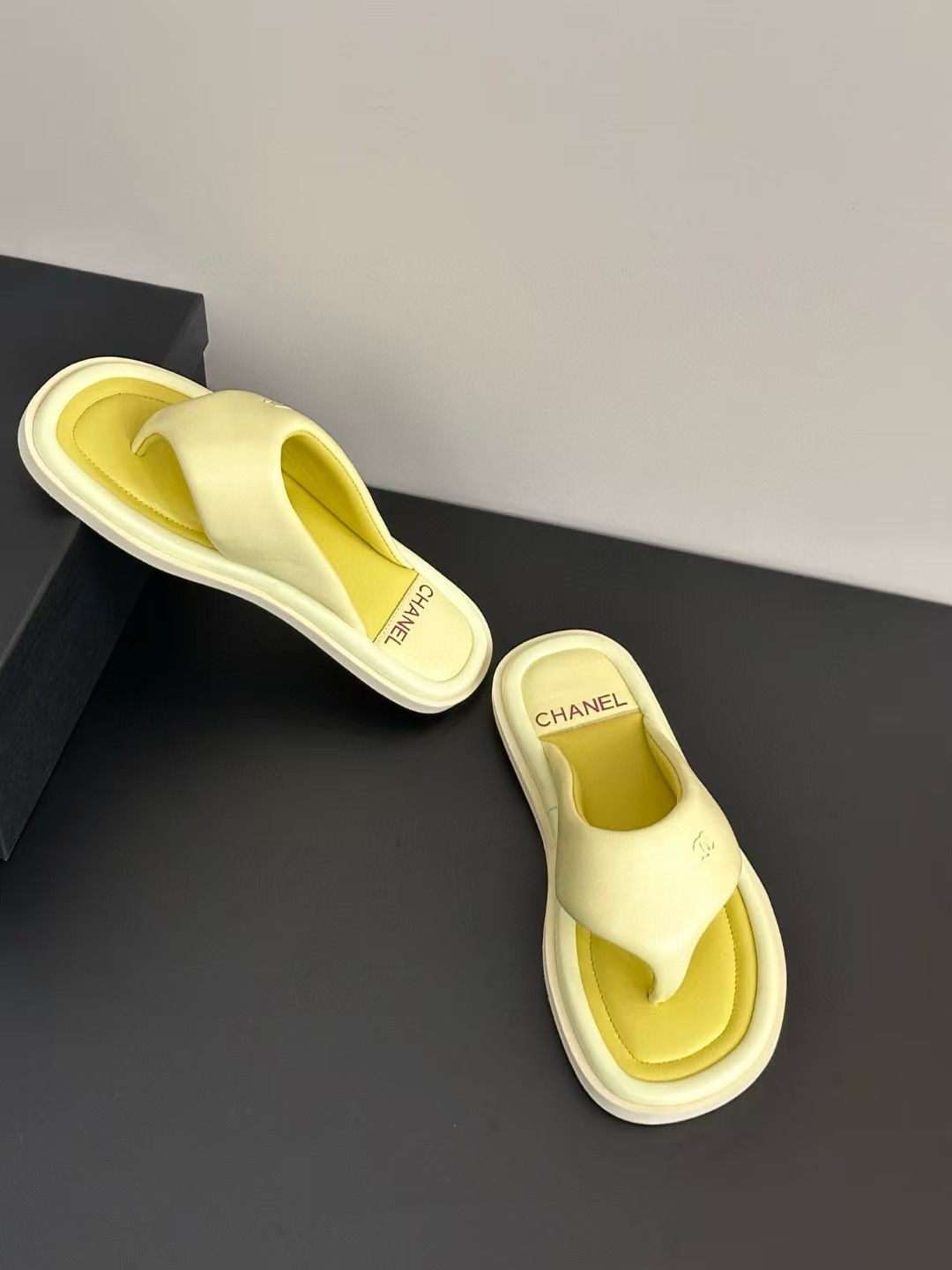 Chanel bread flip-flops