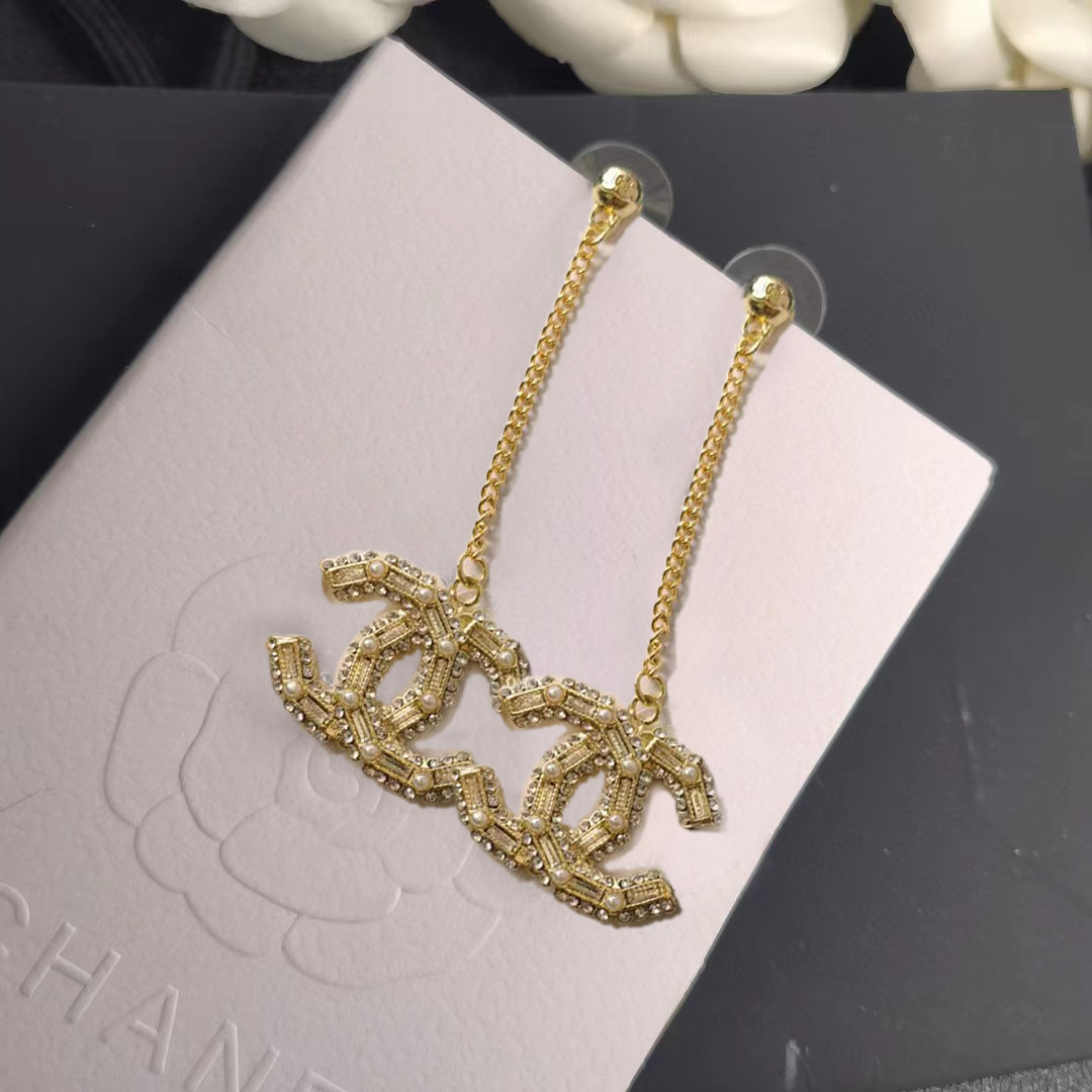 Chanel pearl tassel stud earrings