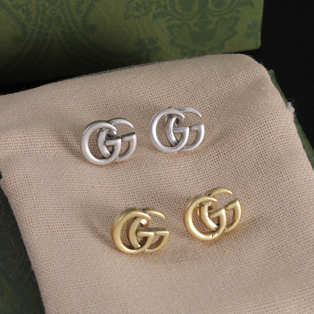 Gucci logo stud earrings