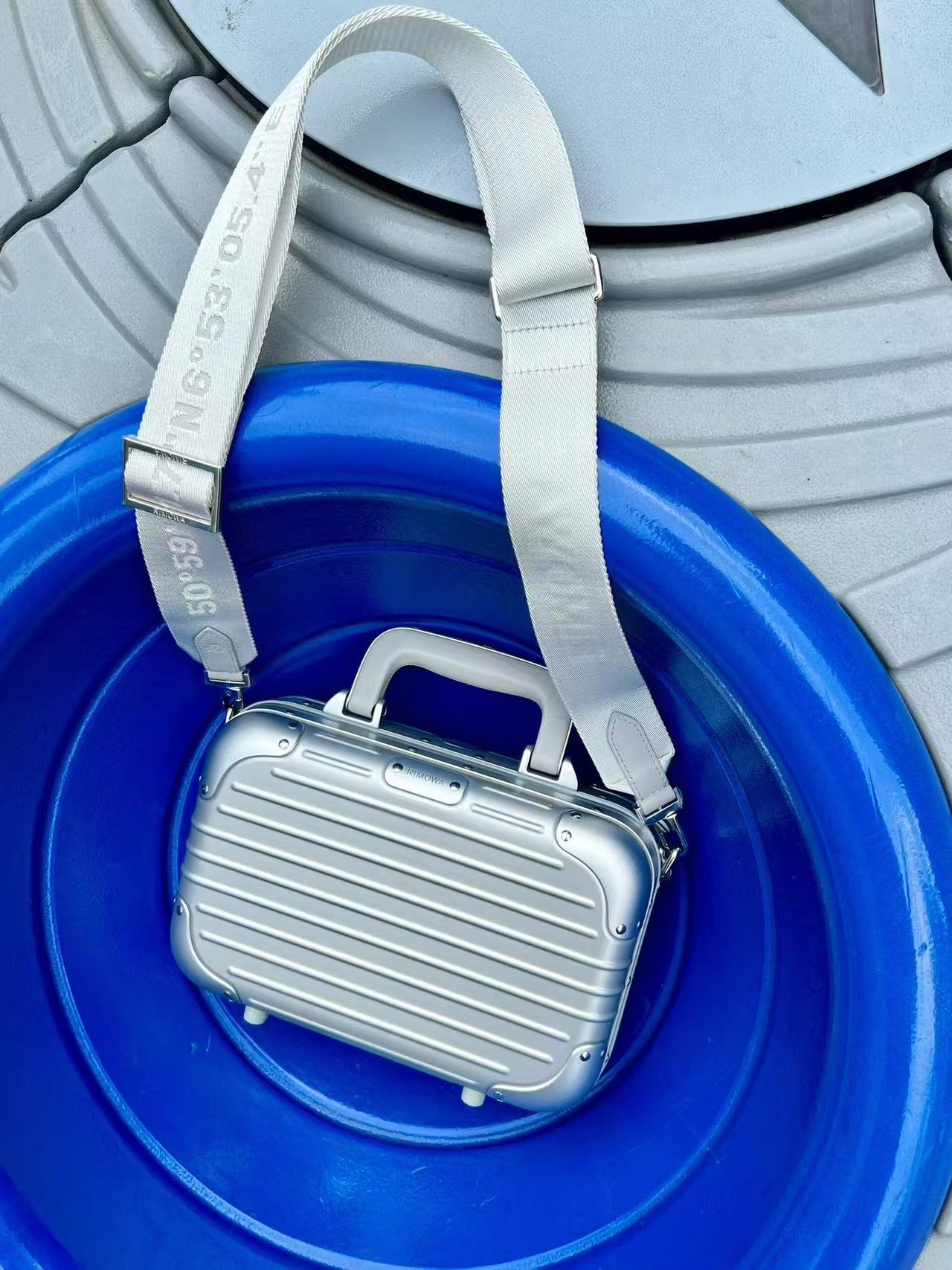 RIMOWA hand-held crossbody suitcase