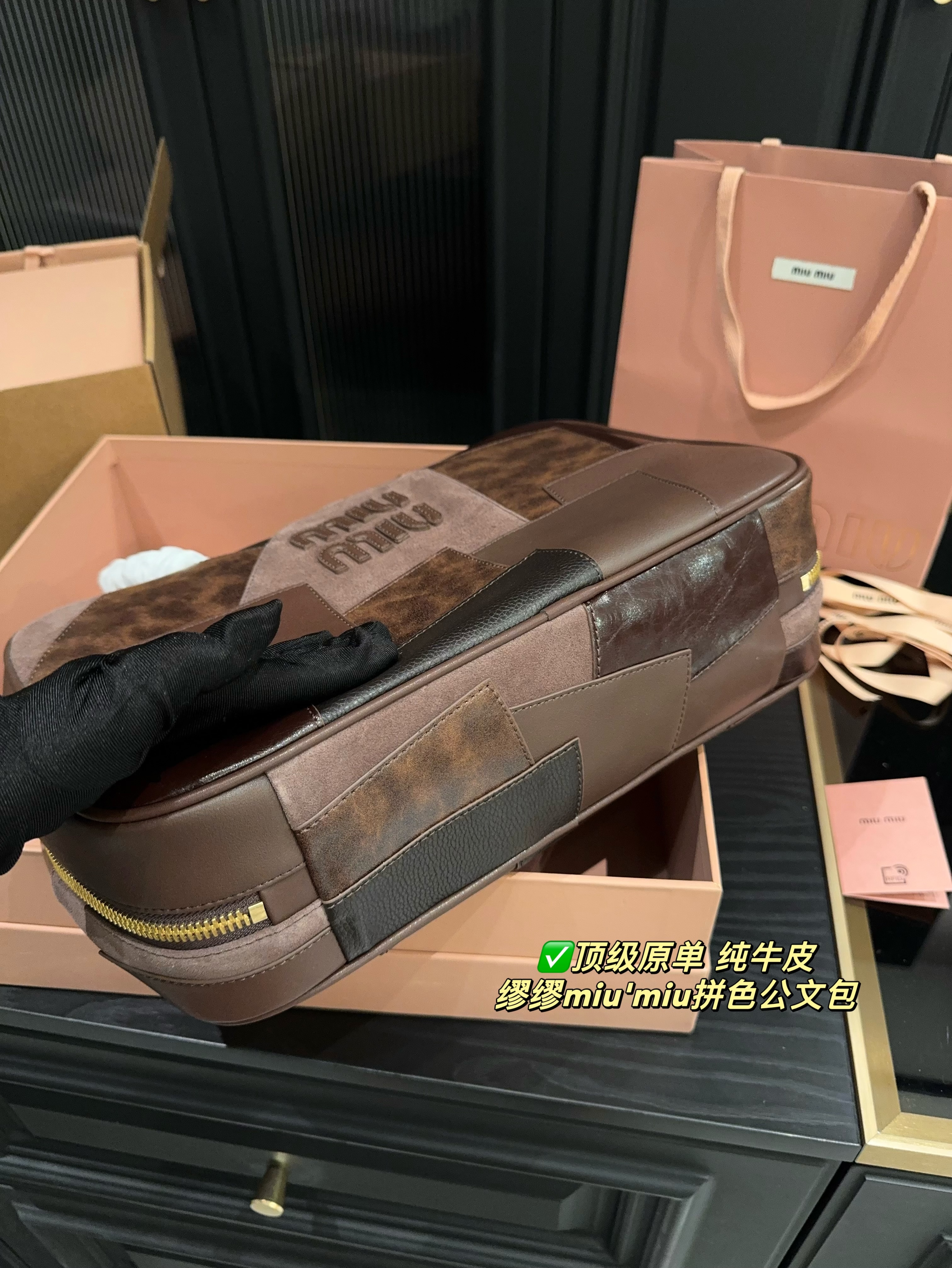 MIUMIU's two-tone briefcase