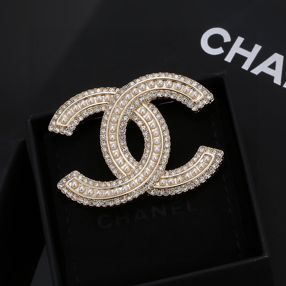 Chanel brooch full of diamonds
