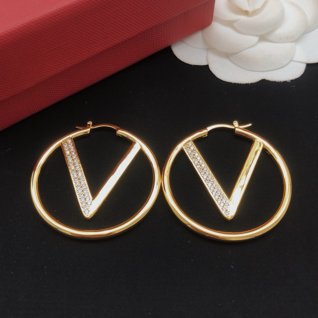 Valentino round earrings