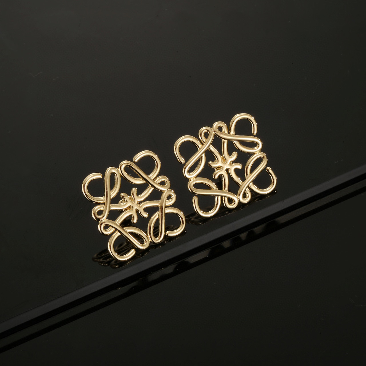 LOEWE golden earrings