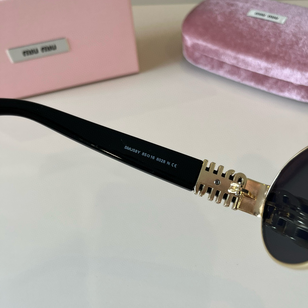 MIUMIU round sunglasses