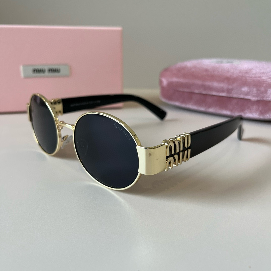 MIUMIU round sunglasses
