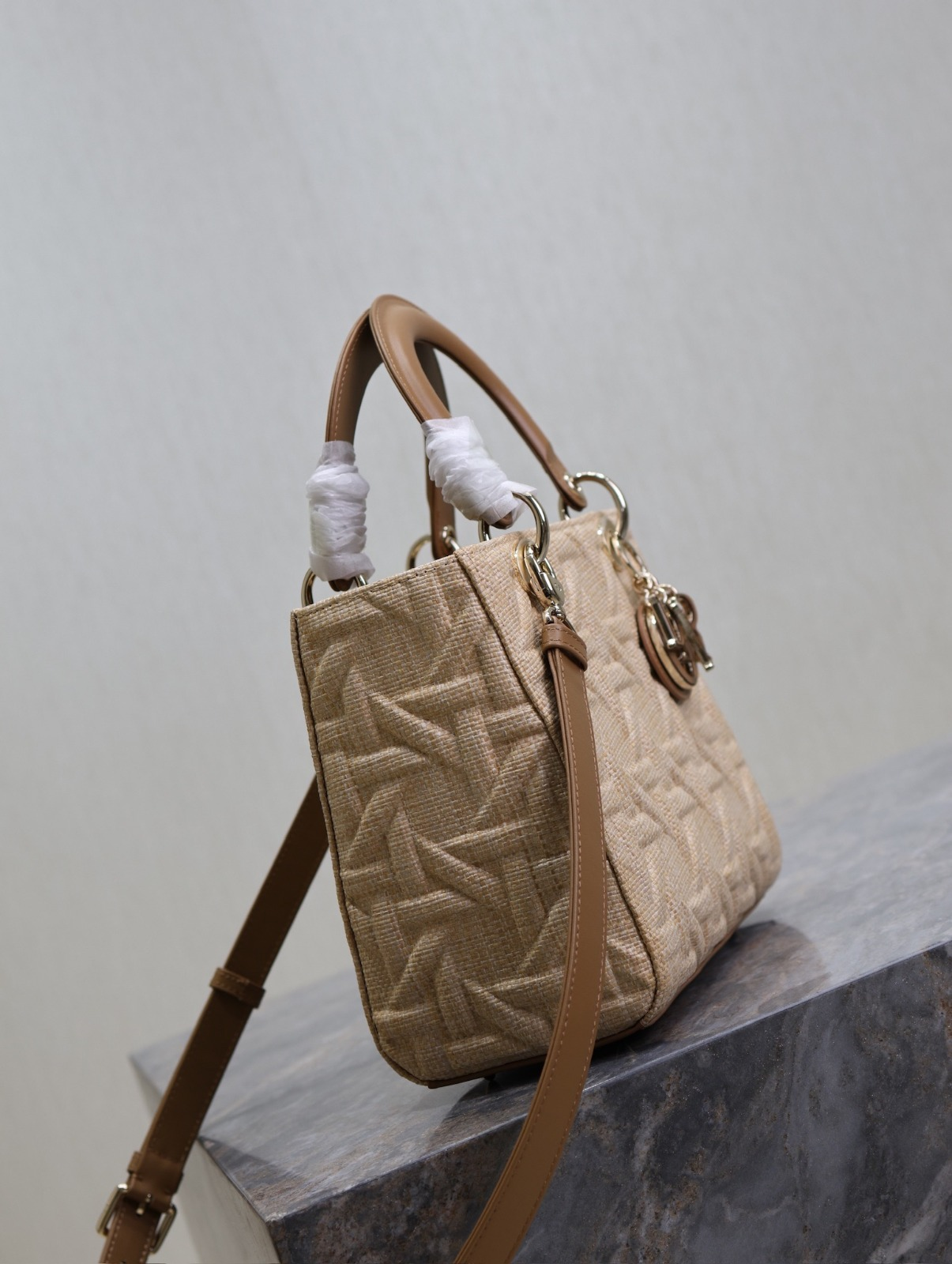 Five-compartment  handbag with “Raffia-patterned woven strips” design