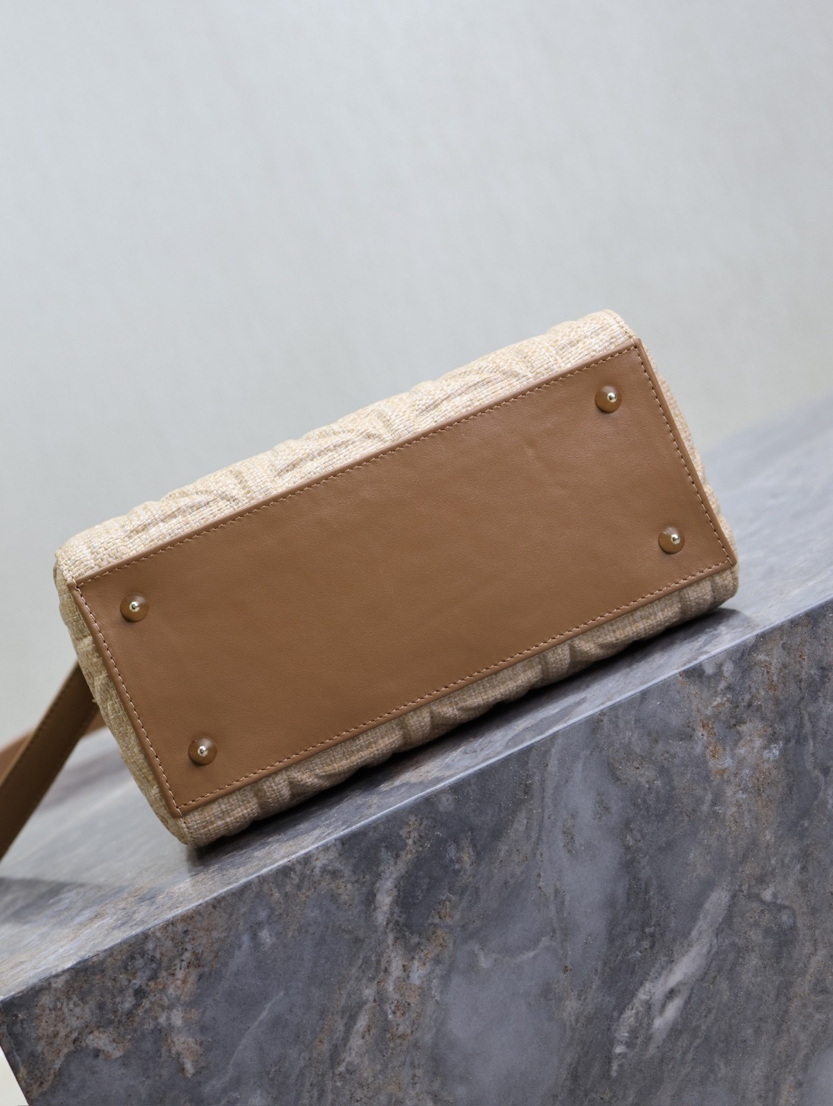 Five-compartment  handbag with “Raffia-patterned woven strips” design