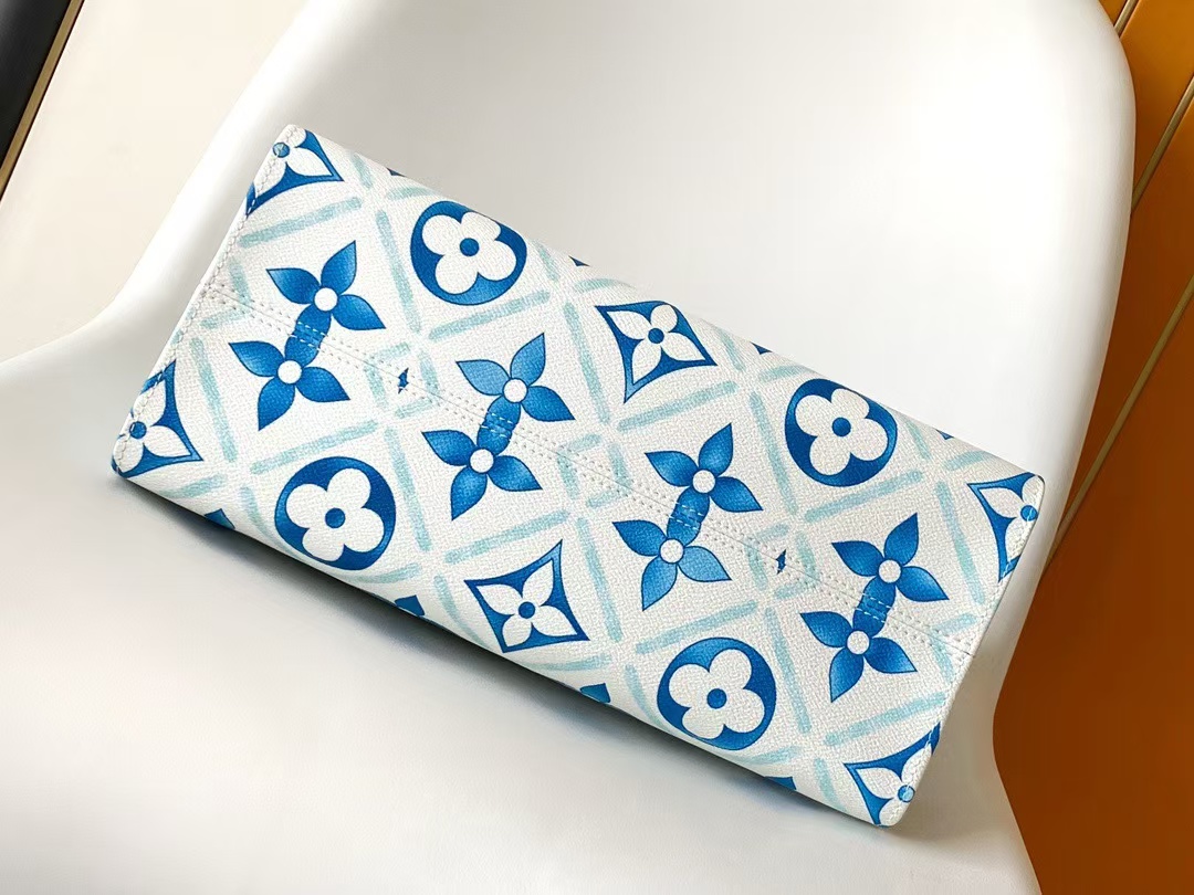 LOUIS VUITTON ONTHEGO MM MONOGRAM EMBLEM IN BLUE & BROWN