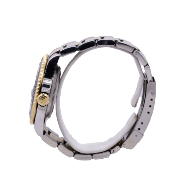 Rolex Submariner Date, 40mm, 18k Yellow Gold and Stainless Steel, Black Dial, 16613