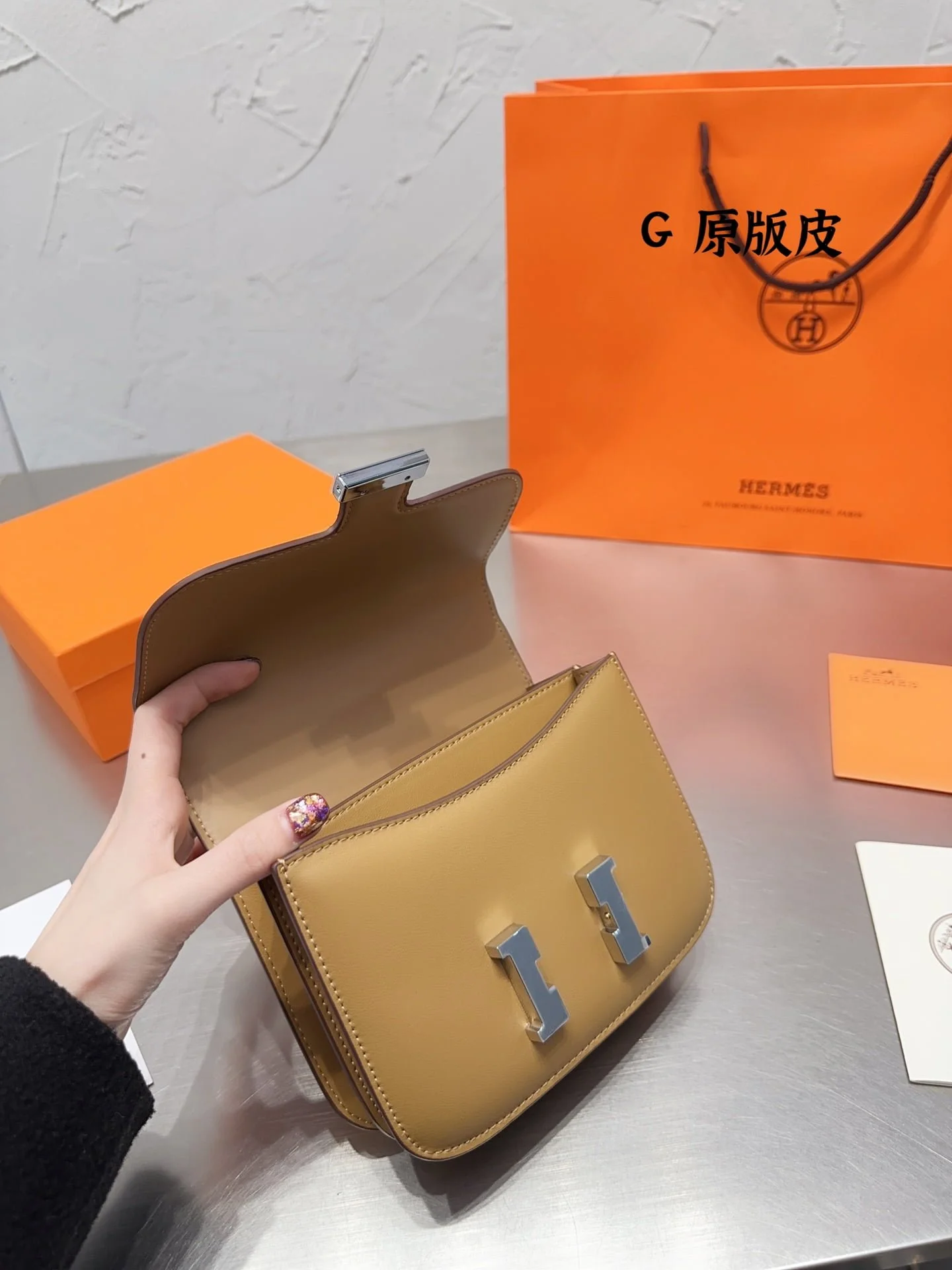 Hermès Constance Swift cowhide leather Earthy yellow size: 19cm - LITELUX
