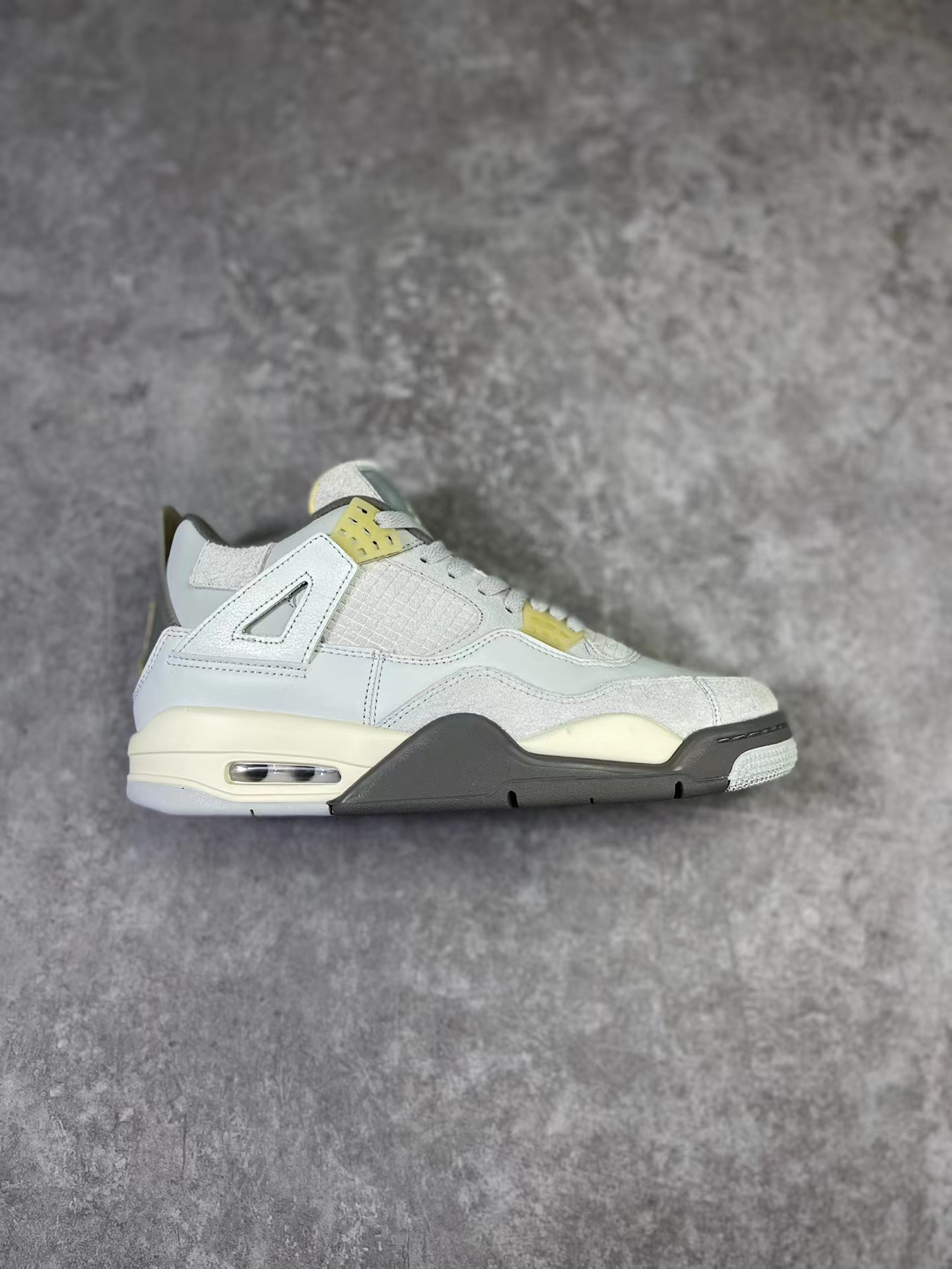 Jordan 4 Retro SE Craft Photon Dust