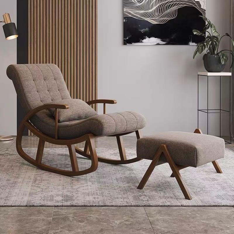 Fauteuil à bascule avec repose-pieds en bois et coussin rembourré