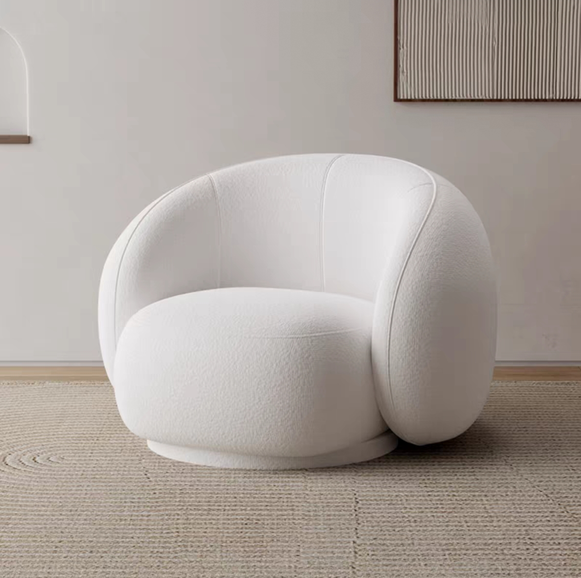 Fauteuil moderne arrondi en tissu, design confortable pour salon