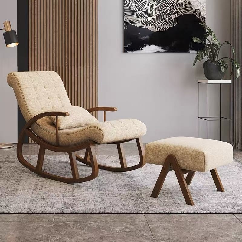 Fauteuil à bascule avec repose-pieds en bois et coussin rembourré