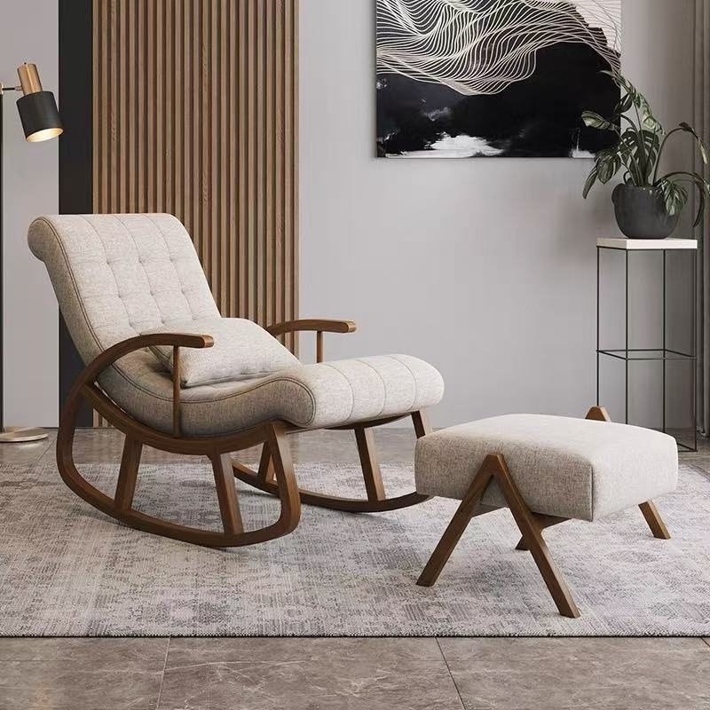 Fauteuil à bascule avec repose-pieds en bois et coussin rembourré