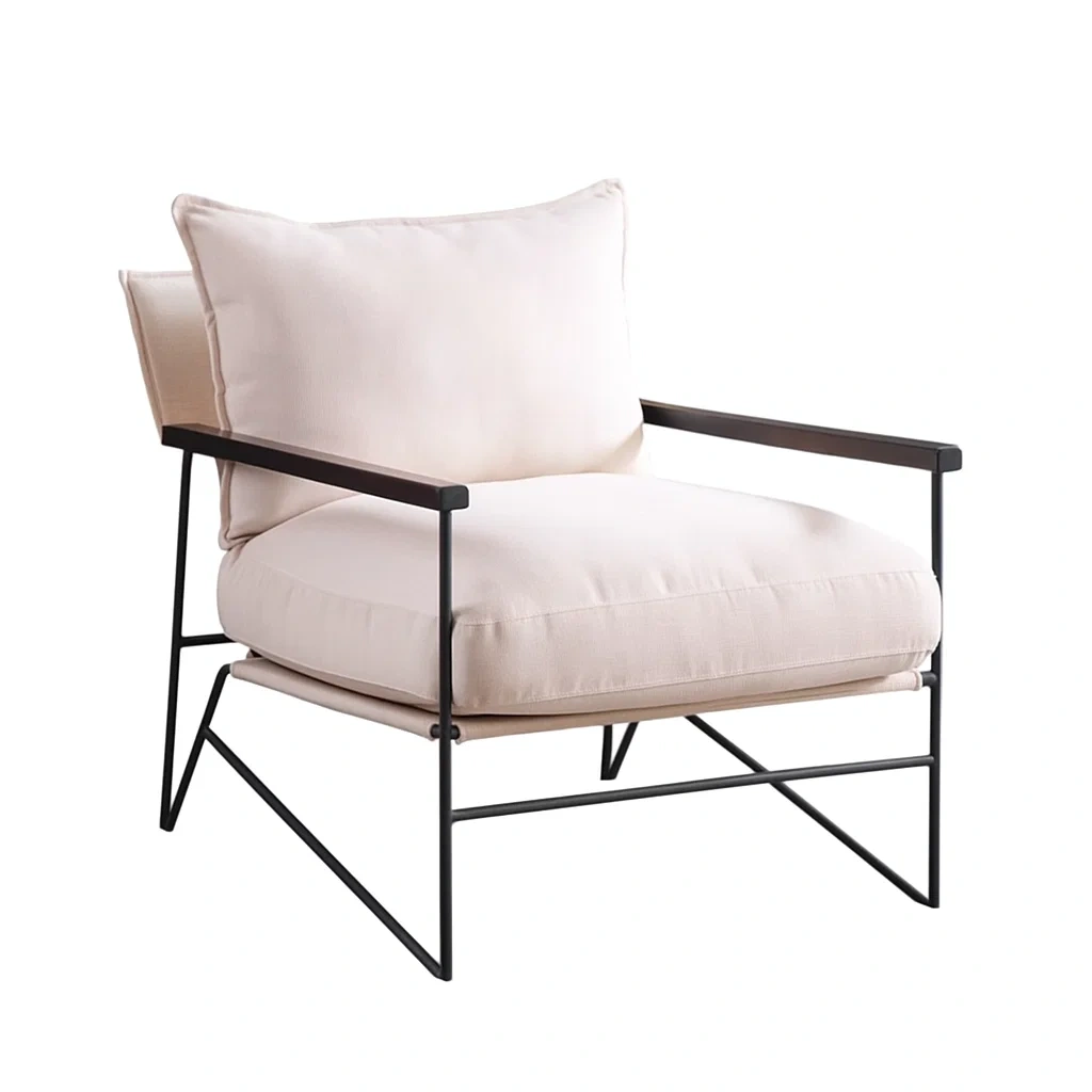 Fauteuil de salon design avec coussins rembourrés et structure en métal