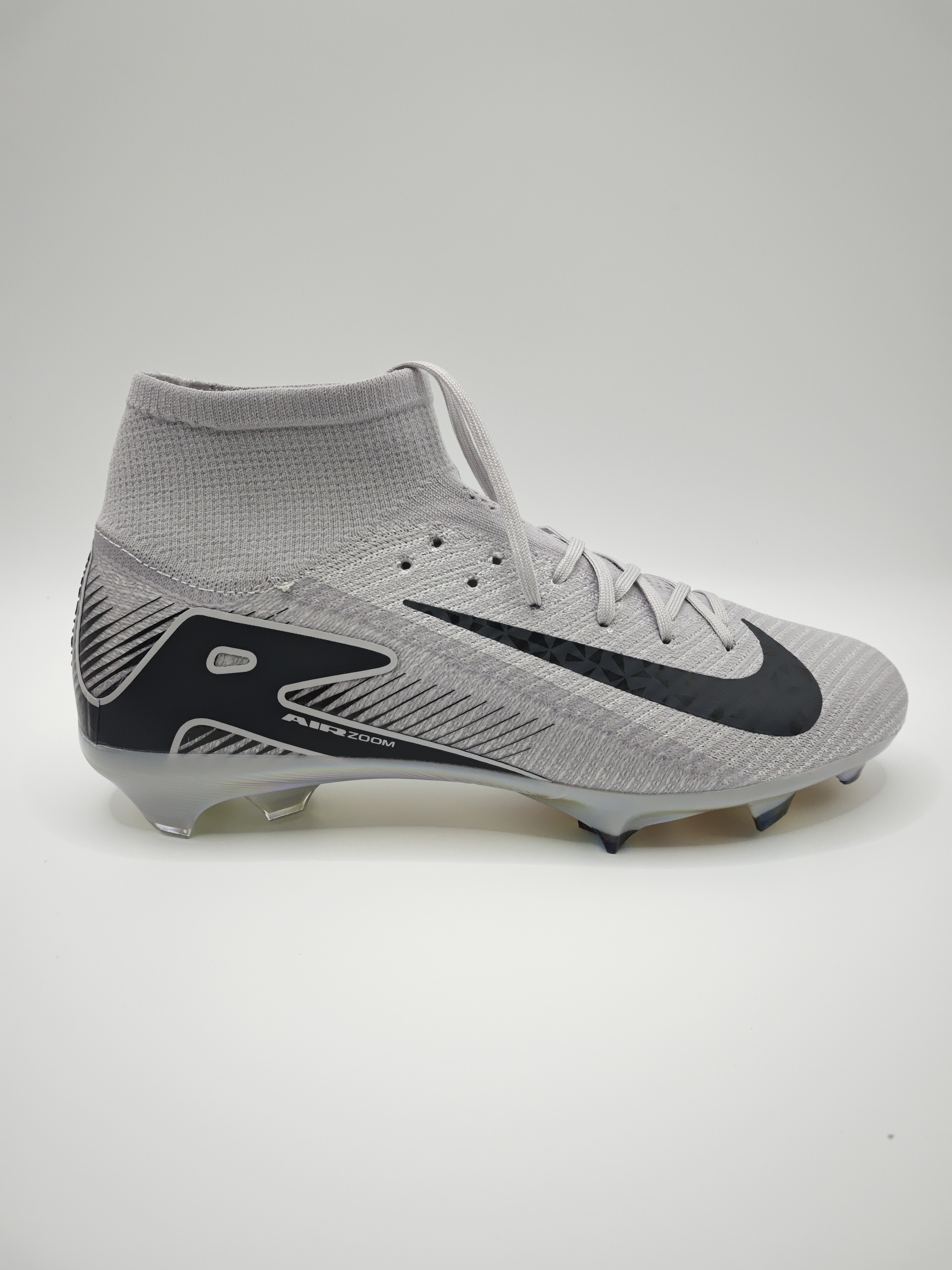 Nike Mercurial 16 FG Soccer Cleats with Built-in Bonded Pack: Full Air Cushion for All-Game Comfort, Waterproof Knit for Rainy Pitches