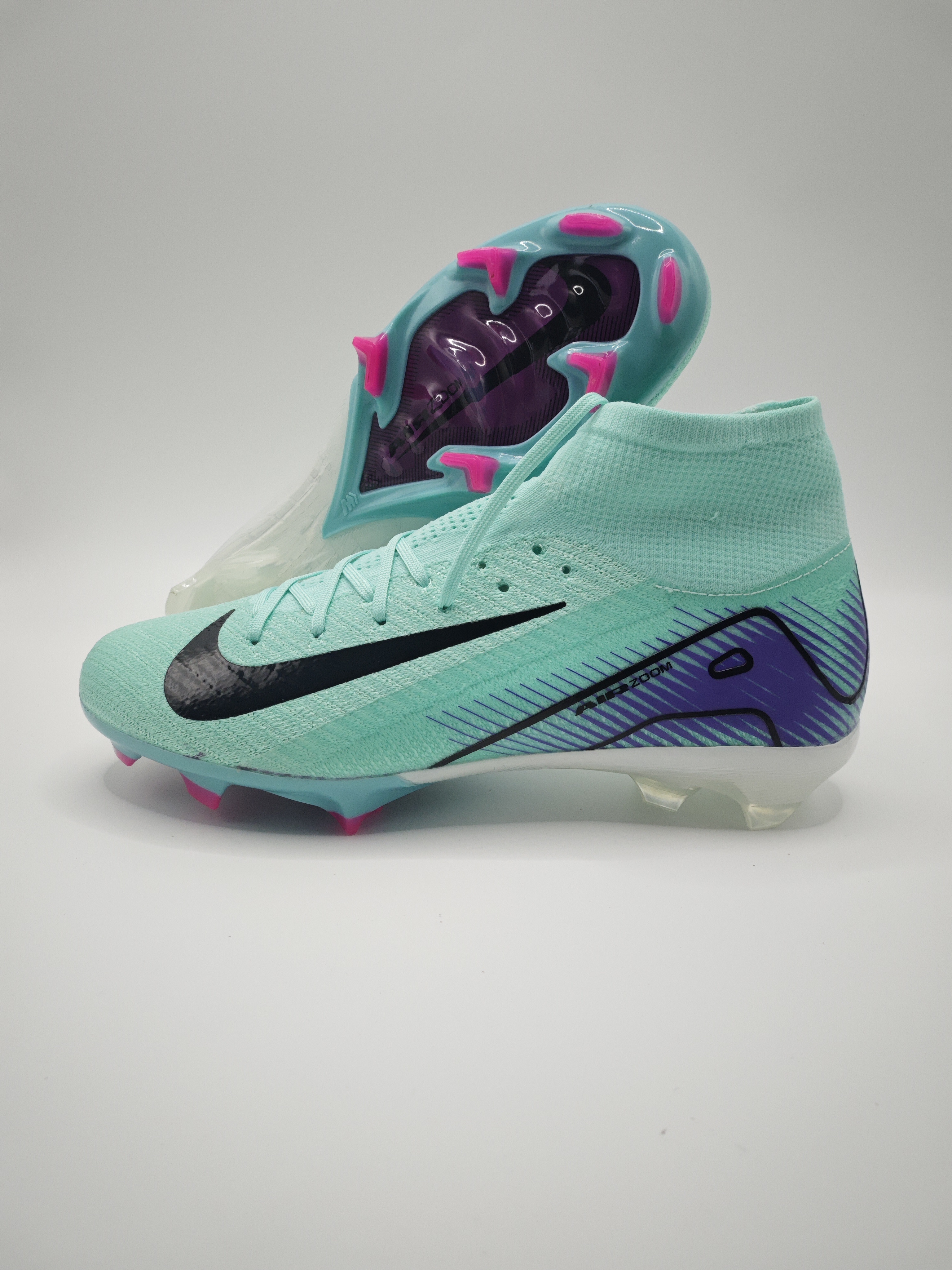 Nike Mercurial 16 FG Soccer Cleats with Built-in Bonded Pack: Full Air Cushion for All-Game Comfort, Waterproof Knit for Rainy Pitches