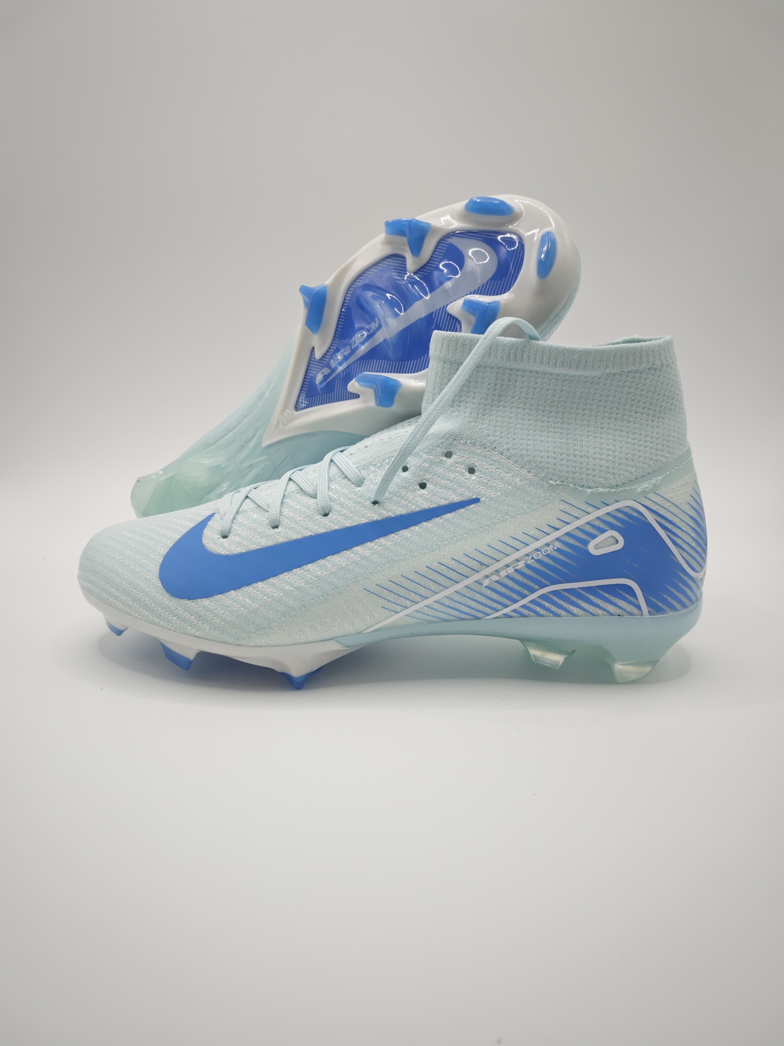 Nike Mercurial 16 FG Soccer Cleats with Built-in Bonded Pack: Full Air Cushion for All-Game Comfort, Waterproof Knit for Rainy Pitches