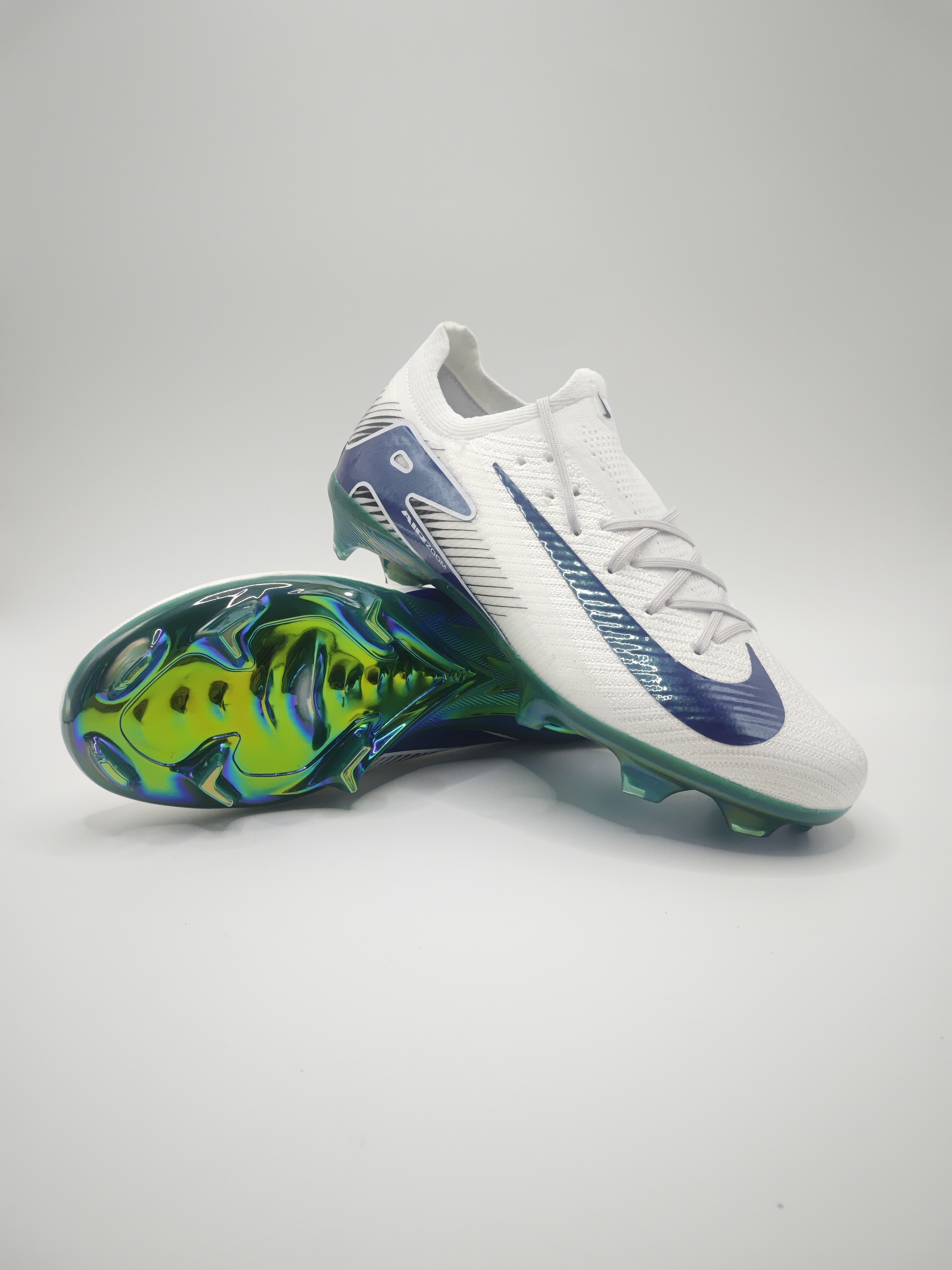 Nike Mercurial 16 FG Soccer Cleats with Built-in Bonded Pack: Full Air Cushion for All-Match Comfort, Waterproof Knit for Wet Fields
