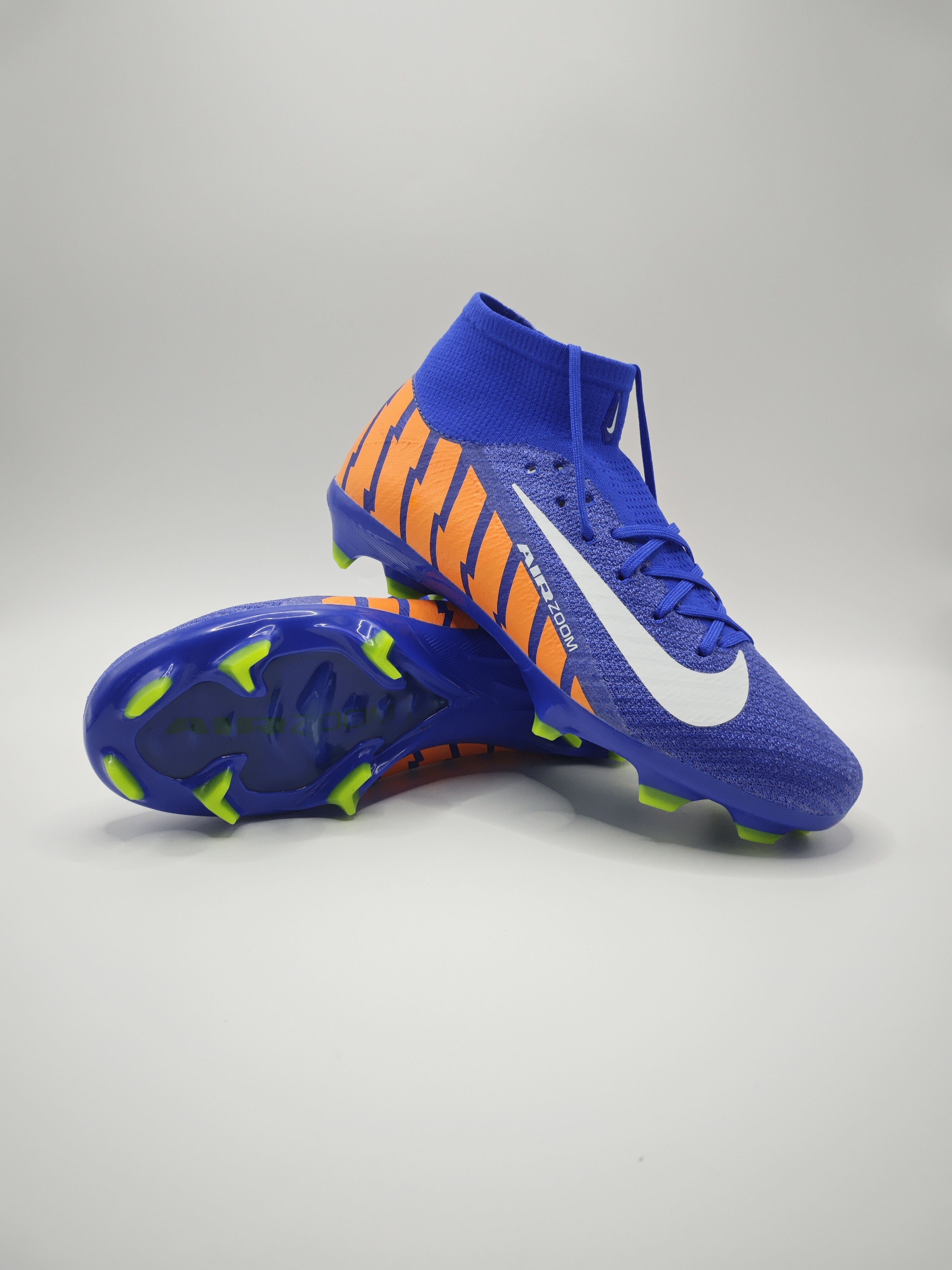 Nike Mercurial 16 FG Soccer Cleats with Built-in Bonded Pack: Full Air Cushion for All-Game Comfort, Waterproof Knit for Rainy Pitches